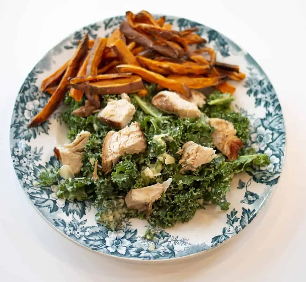Kale Caesar Salad and Sweet Potato Fries