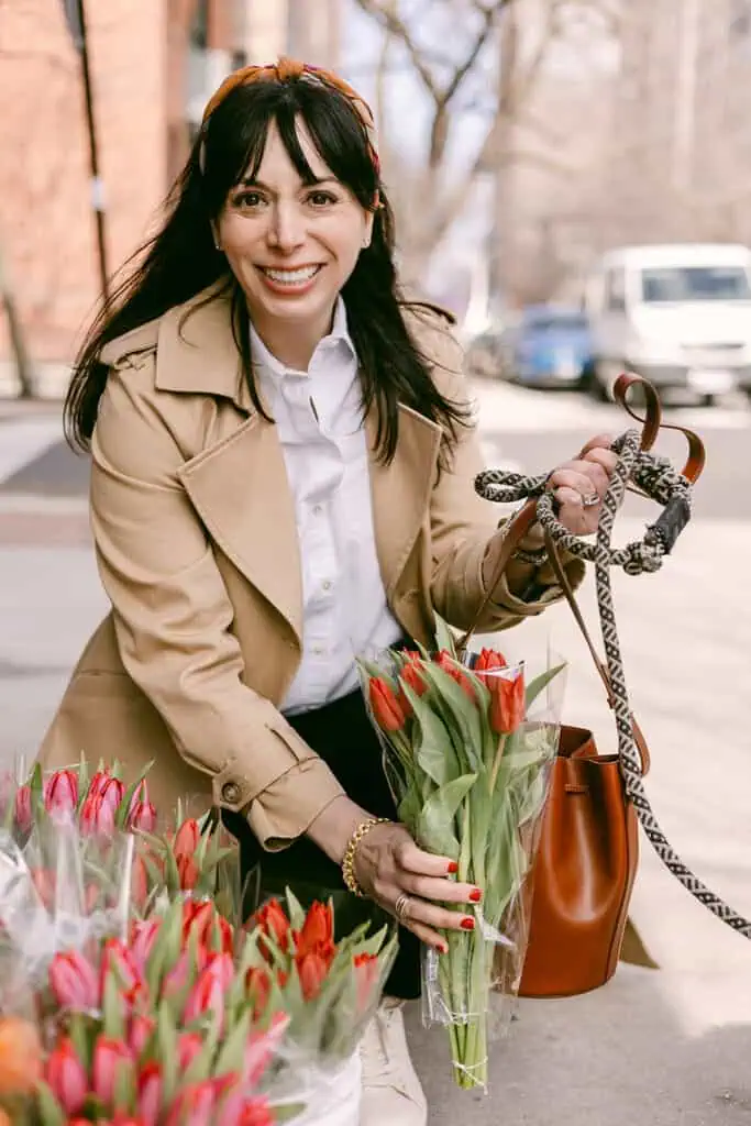 trench coat and scarf tied as accessory for spring